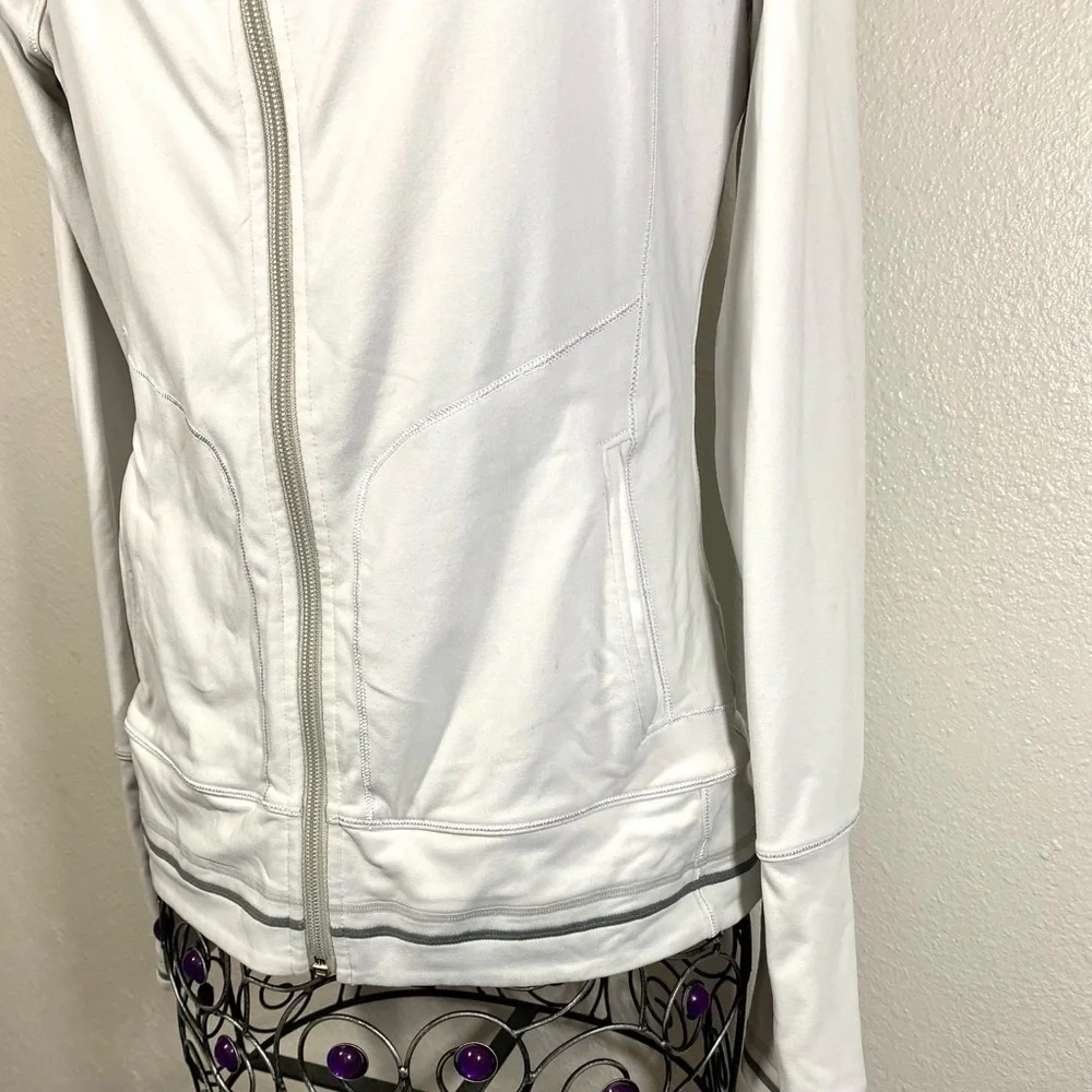 ALO off white athletic zip up jacket size S